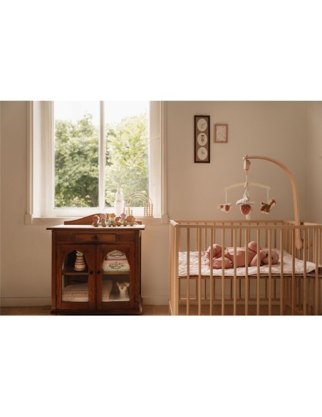 Movil musical de madera rosa