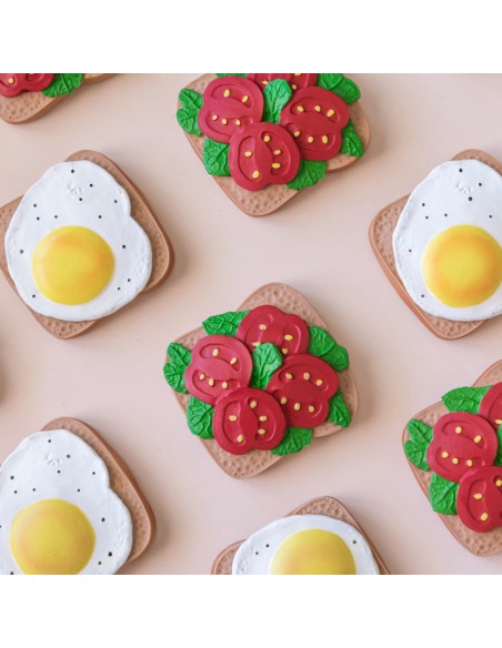 Mordedor bebé tostada tomate